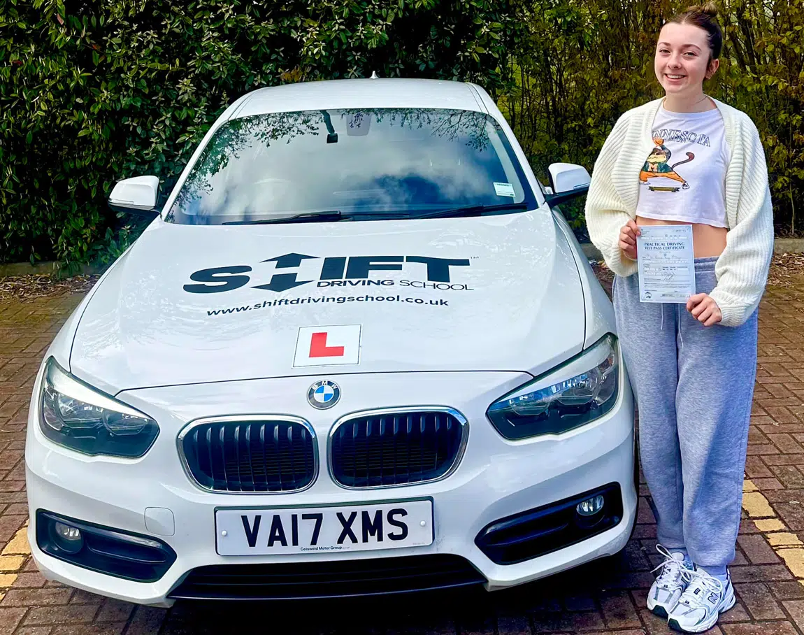 Eleanor's Pass picture with Shift Driving School's White BMW Learner Car